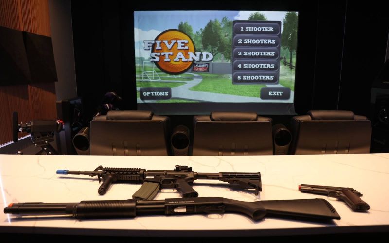 Shooting simulator setup showcasing realistic gameplay with immersive graphics, part of the sports simulators and theaters solutions by ResTech Systems.